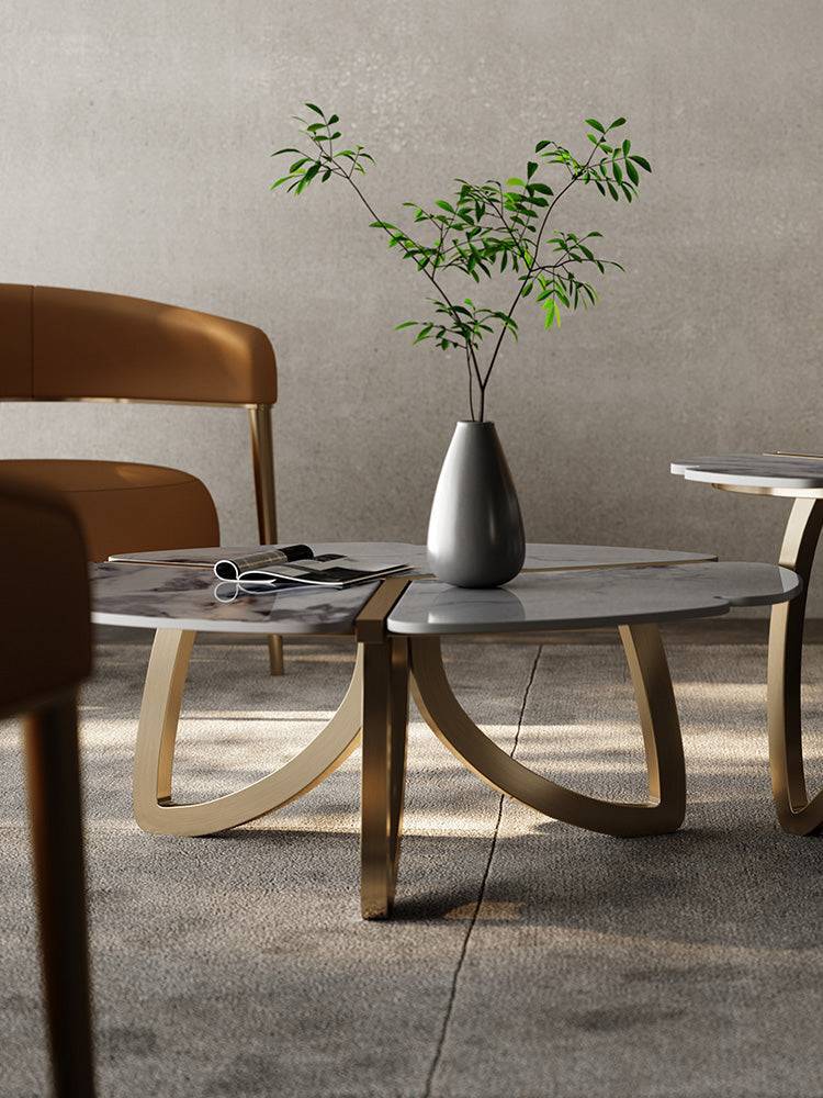 a table with a vase with a plant on it