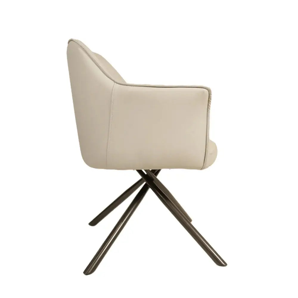 a white chair sitting on top of a wooden tripod