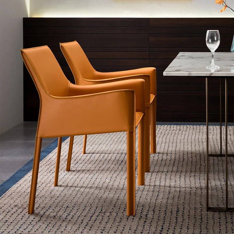 a dining room with a table and chairs