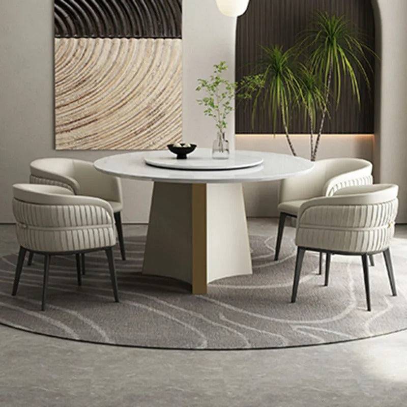 a round table with four chairs around it
