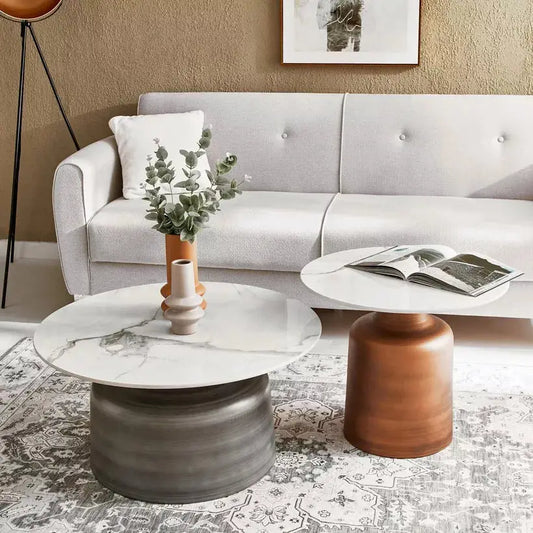 a living room with a white couch and a coffee table