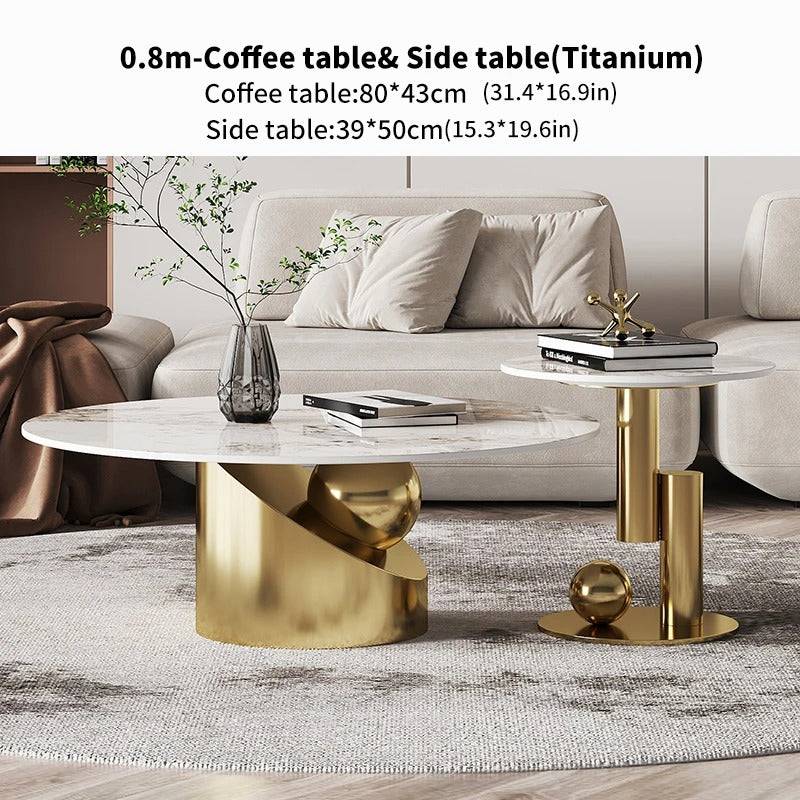 a coffee table with a marble top and gold legs