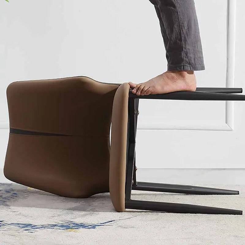 a person standing on top of a chair