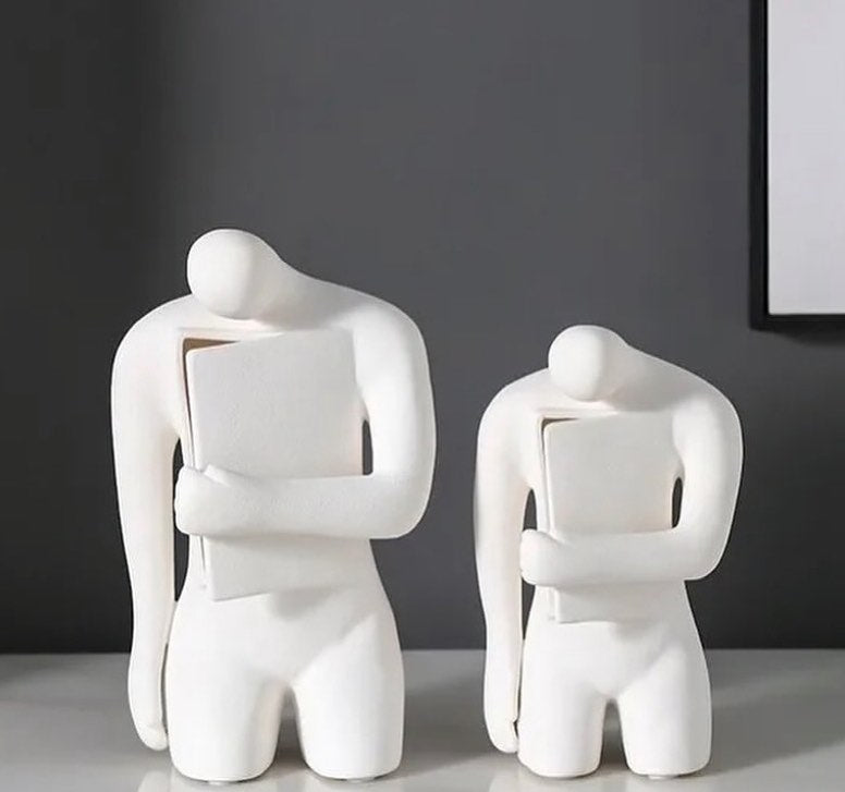 Men holding a book Porcelain table decor - set of 2