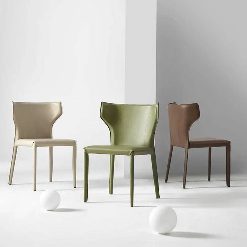 a group of three chairs sitting next to each other