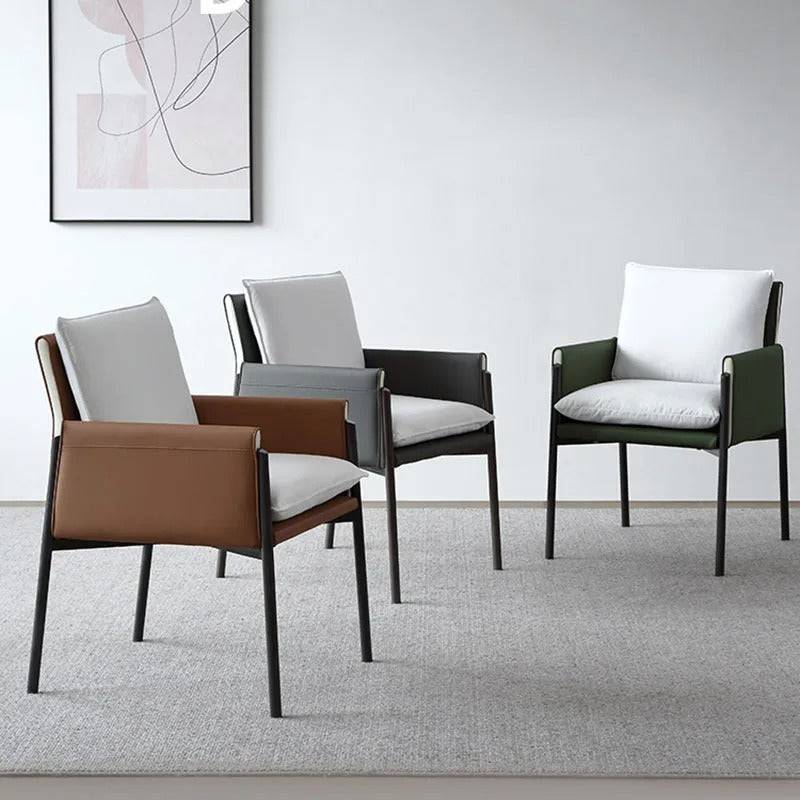 a group of four chairs sitting next to each other
