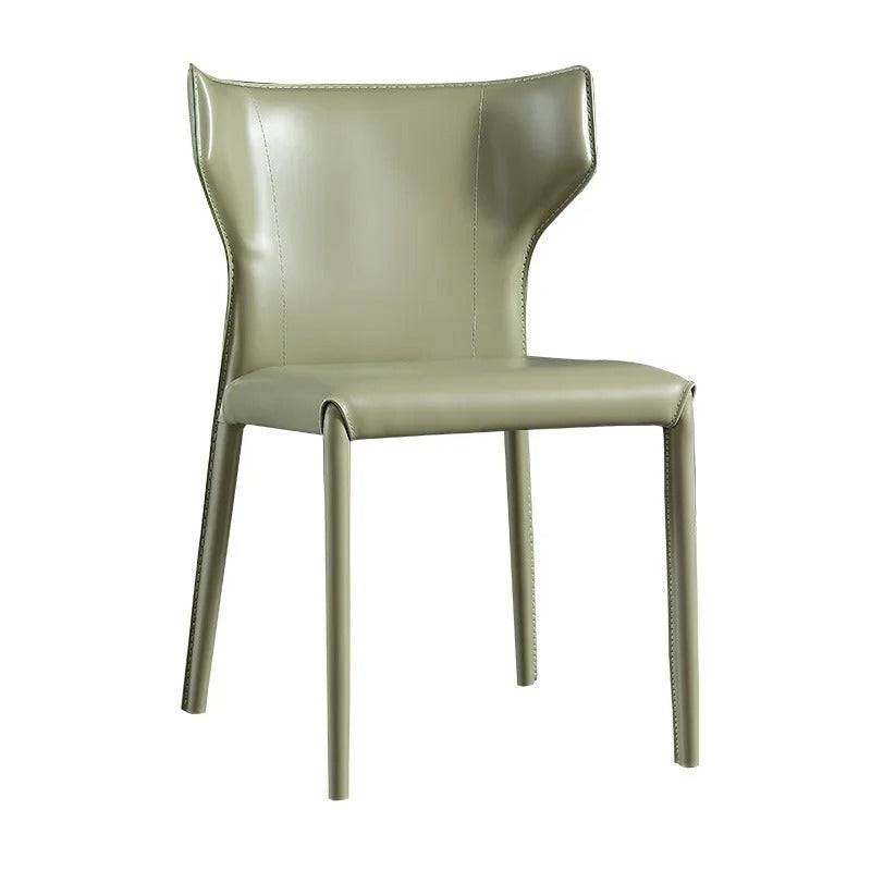 a light green chair with a curved back