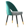 a green chair with a black and white checkered seat