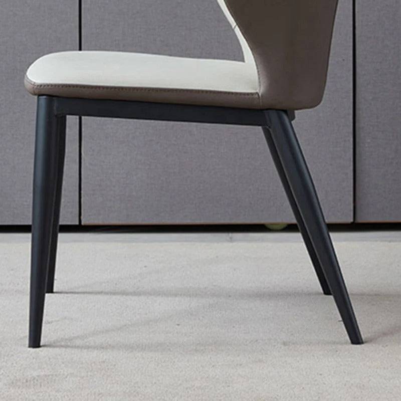 a chair with a white seat and black legs