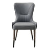 a gray leather chair with wooden legs