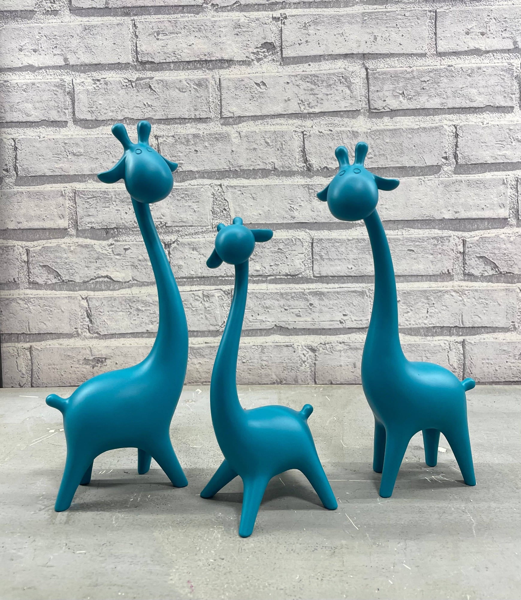 Family Of Giraffe Sculptures