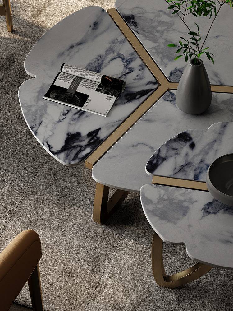 a table with a book and a vase on it