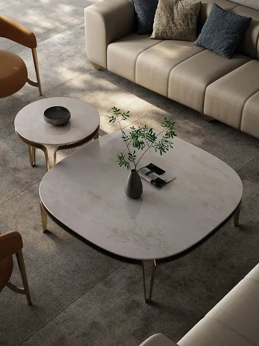 a living room filled with furniture and a table
