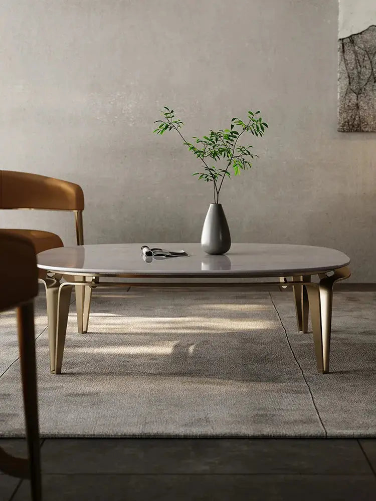 a table with a vase of flowers on top of it