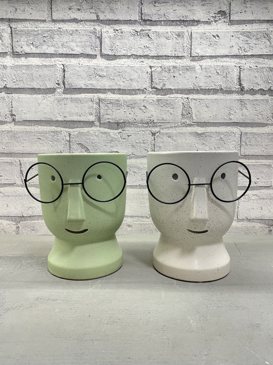 Optical face table vase