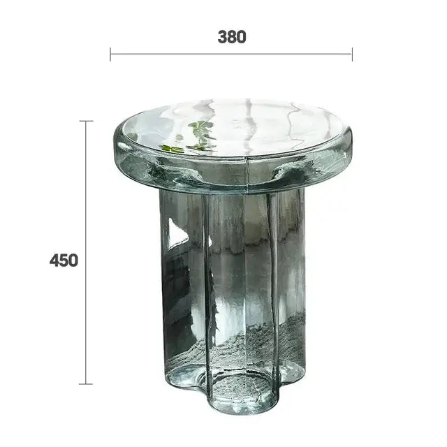 a glass side table with a glass top