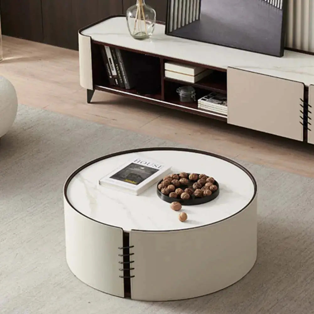 a living room with a coffee table and a television