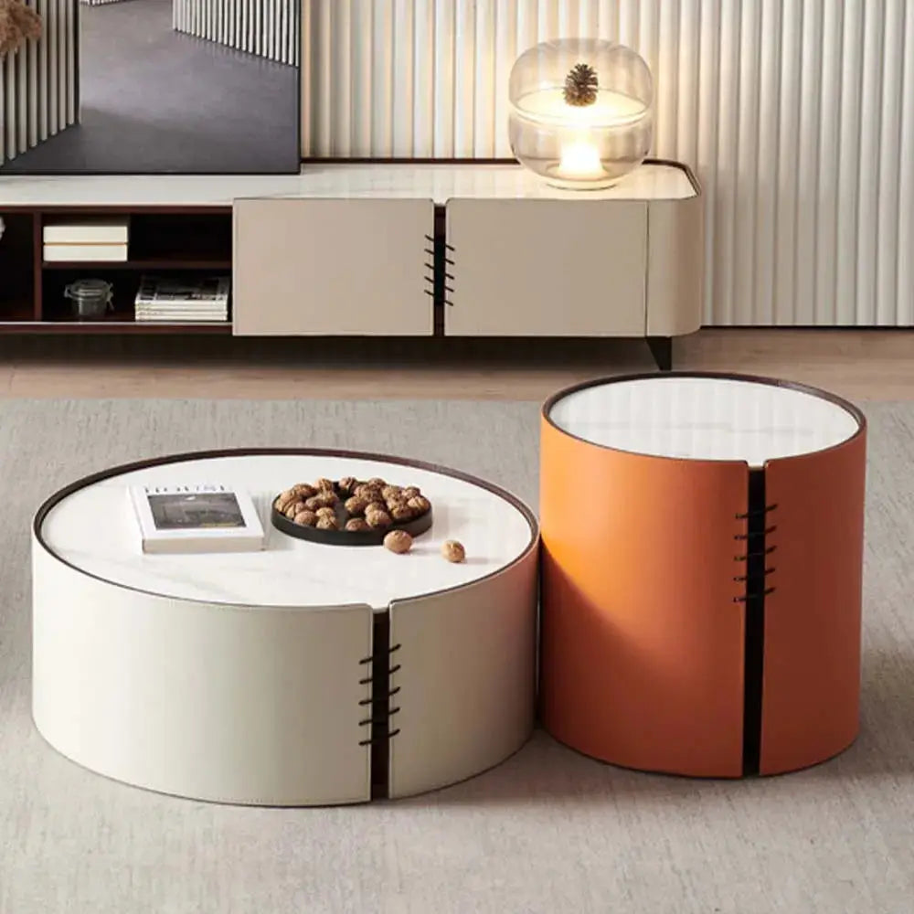a living room with a coffee table and a television