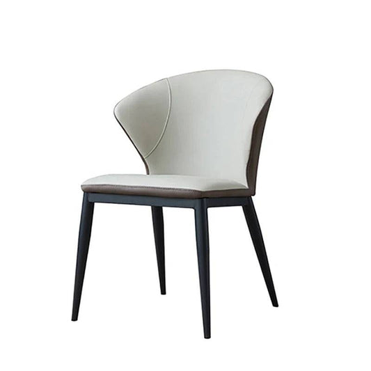 a white chair with a black frame