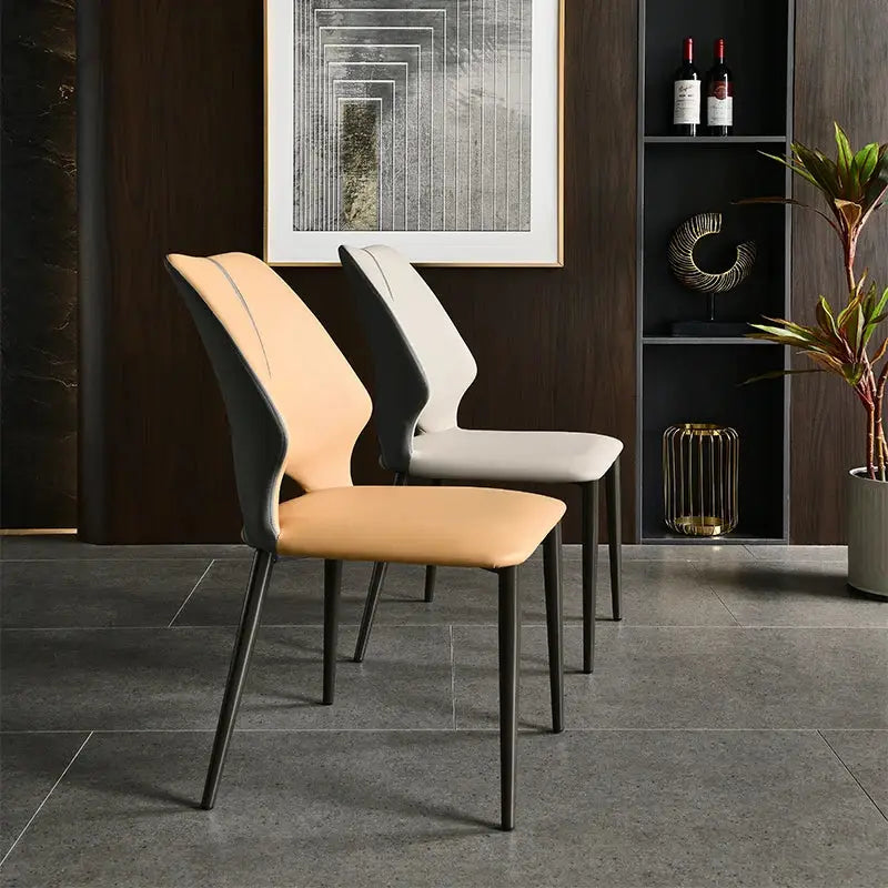 a group of four chairs sitting next to each other