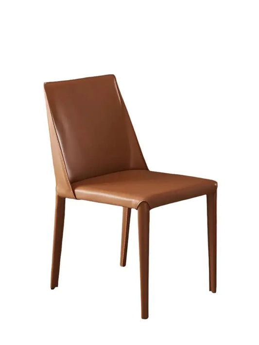 a brown leather chair on a white background
