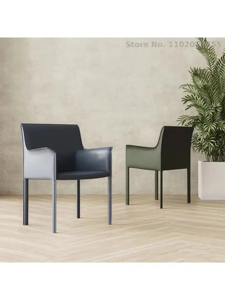 a couple of chairs sitting on top of a wooden floor