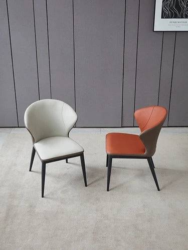 a couple of chairs sitting next to each other