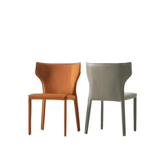 a pair of chairs sitting next to each other