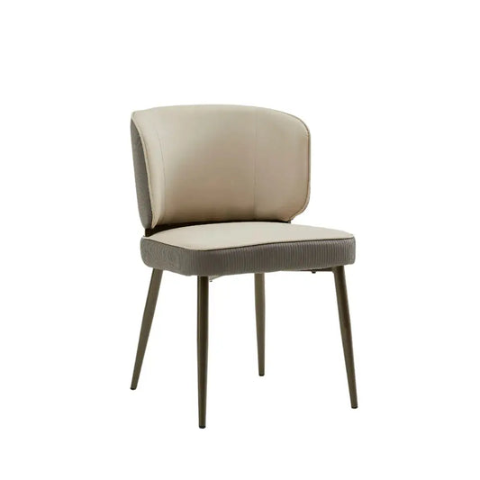 a white chair with a beige seat and back
