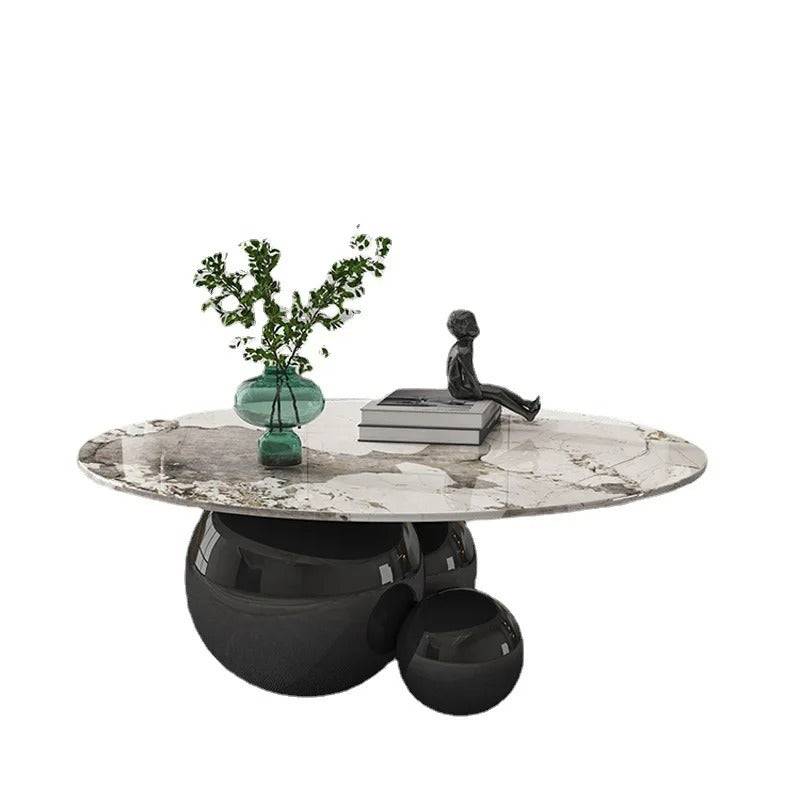 a table with a vase of flowers on top of it